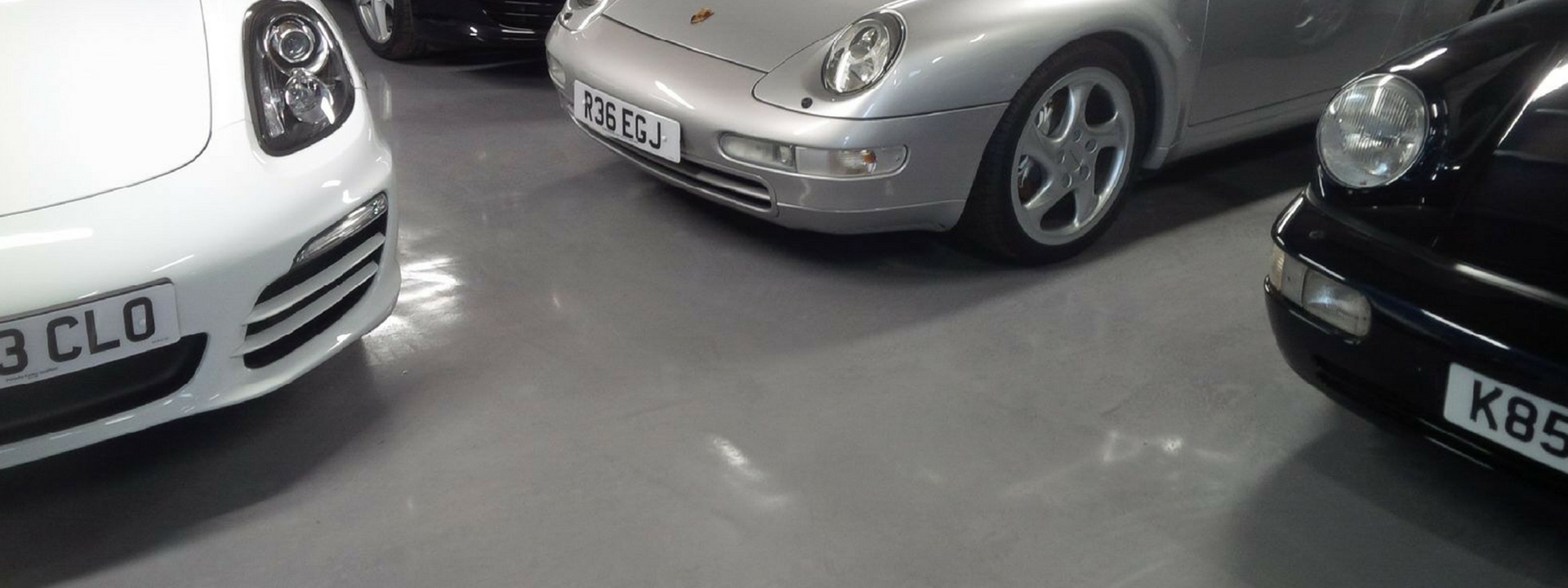 Porche cars in garage showing Garage Floor Coating